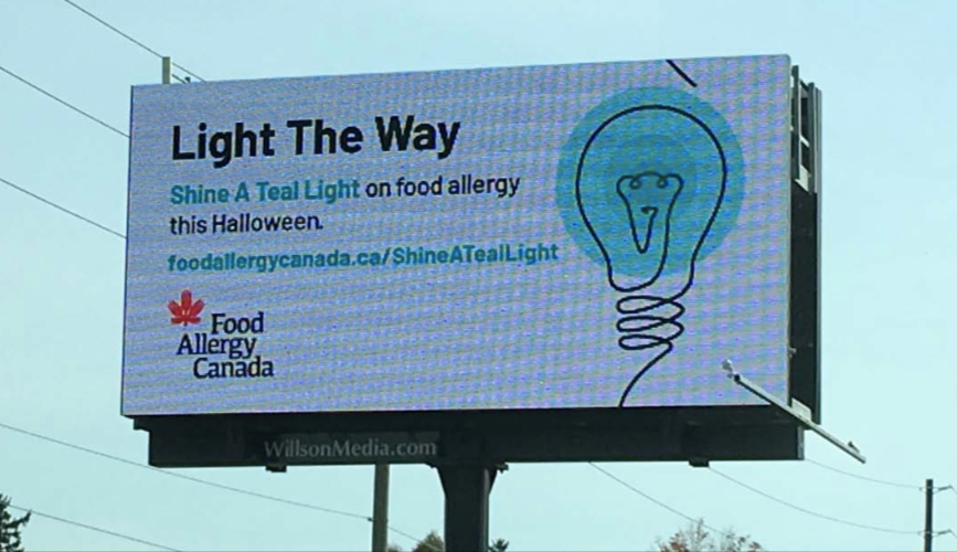 #ShineATealLight ad displayed on screen