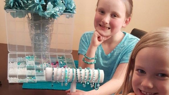 Danica and Delaney with their bracelets
