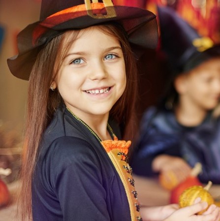 Girl dressed up in a witch costume