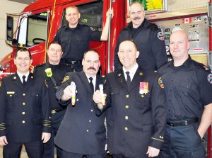 Firefighters Kevin Strong and Dave Pickard (back row) and (front from left to right) deputy chief Michael Rozario, Rick Walker, Doug Bolton, Reno Levesque and Scott Shepherd unveiled the addition of EpiPens to the Georgina Fire Department's arsenal of potentially life-saving equipment last week.