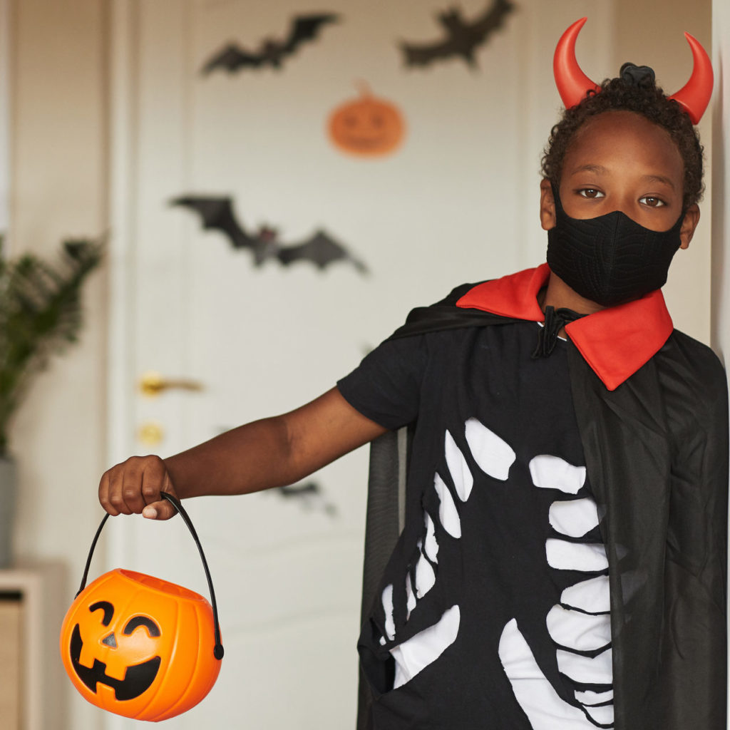Boy Ready To Trick Or Treat Wearing Mask