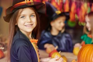 Girl dressed up as a witch on Halloween