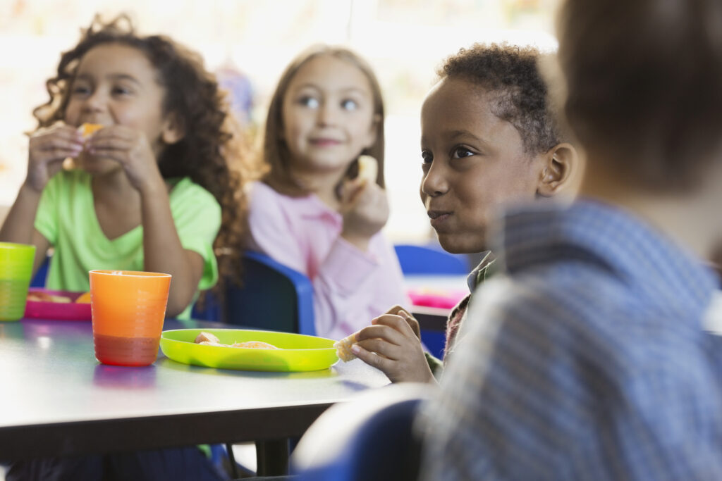 Children eating in a classroom